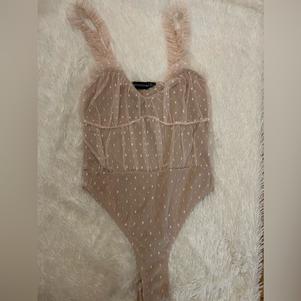 Light pink tulle with white polkadots bodysuit from Pretty Little Thing